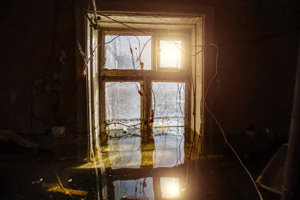 Flooded old house. Flooded old window. Natural disaster concept.