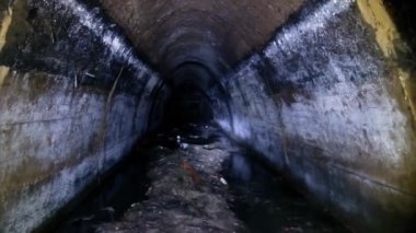 Underground urban sewer tunnel. Large sewage collector.