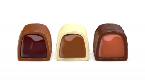 含焦糖 樱桃和巧克力奶油的白巧克力 黑巧克力和牛奶巧克力 — 图库视频影像