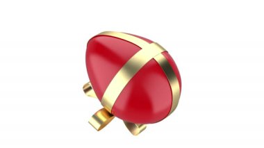 Red egg with golden ribbon on white background, Easter decoration