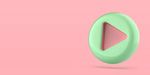 粉色背景上的绿色塑料播放按钮 — 图库照片