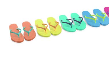 Beyaz arkaplanda renkli parmak arası terliklerle satır