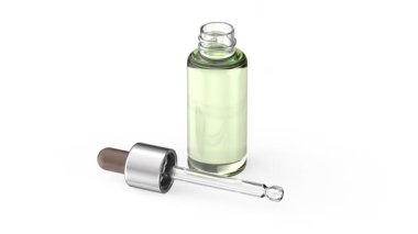 Yeşil sıvı ve beyaz zemin üzerinde boru ile cam şişe