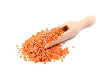 lentils and spoon on white background close up