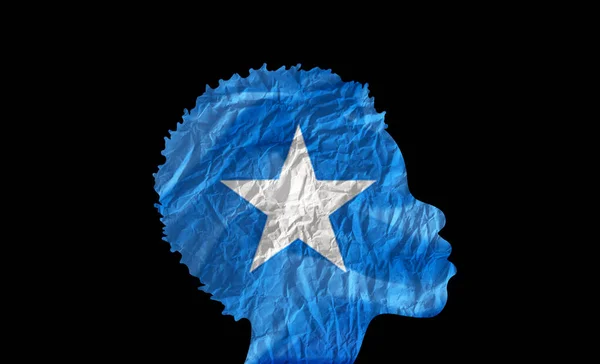 悬挂索马里国旗的非洲妇女形象 — 图库照片#