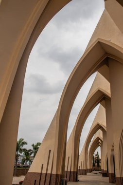Exterior with arches, crosses, decorative walls of Catholics church in Abuja, church is known as The National Christian Centre (previously known as the National Ecumenical Centre or as the National Church of Nigeria) is a Christian place of worship