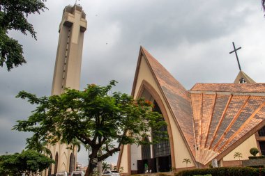 Exterior with arches, crosses, decorative walls of Catholics church in Abuja, church is known as The National Christian Centre (previously known as the National Ecumenical Centre or as the National Church of Nigeria) is a Christian place of worship