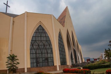 Exterior with arches, crosses, decorative walls of Catholics church in Abuja, church is known as The National Christian Centre (previously known as the National Ecumenical Centre or as the National Church of Nigeria) is a Christian place of worship