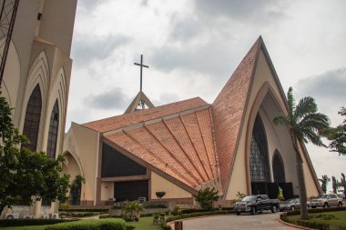 Exterior with arches, crosses, decorative walls of Catholics church in Abuja, church is known as The National Christian Centre (previously known as the National Ecumenical Centre or as the National Church of Nigeria) is a Christian place of worship