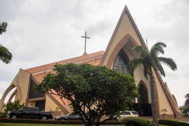 Exterior with arches, crosses, decorative walls of Catholics church in Abuja, church is known as The National Christian Centre (previously known as the National Ecumenical Centre or as the National Church of Nigeria) is a Christian place of worship