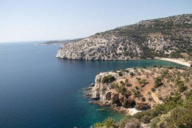 White cliff over the blue Sea with small vegetation on top, very attractive and picturesque scene