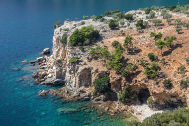 White cliff over the blue Sea with small vegetation on top, very attractive and picturesque scene