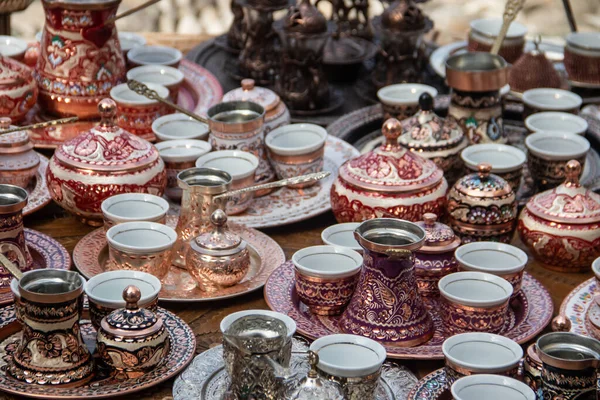 Turkish delight cups, pots, tea kettles and souvenirs are made of copper. Mostar city in Bosnia and Herzegovina. Local traditional handicraft production for tea and coffee lovers