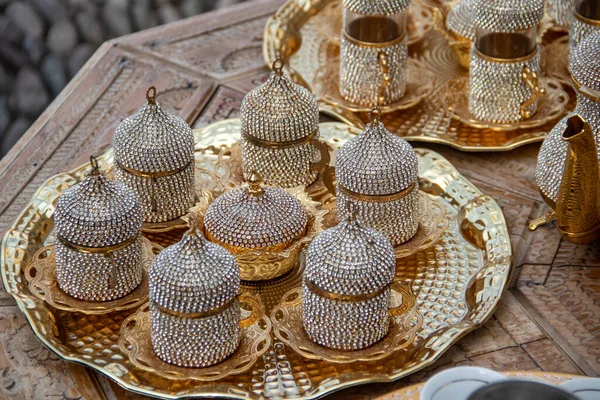 Turkish delight cups, pots, tea kettles and souvenirs are made of copper. Mostar city in Bosnia and Herzegovina. Local traditional handicraft production for tea and coffee lovers