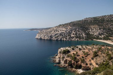 White cliff over the blue Sea with small vegetation on top, very attractive and picturesque scene