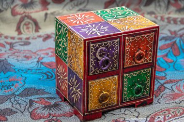 Hand made colorful and decorative wooden box to keep jewelry inside, traditional box made in Afghanistan, Kabul, purchased in Chicken street shop clipart