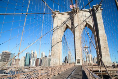 Brooklyn bridge connecting Brooklyn island with financial district on Manhattan, New York, United States of America