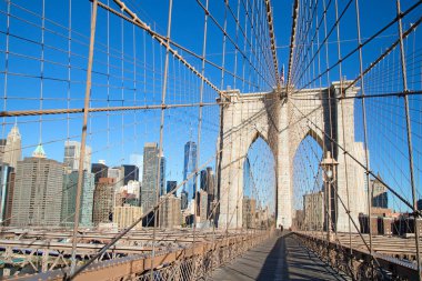 Brooklyn bridge connecting Brooklyn island with financial district on Manhattan, New York, United States of America