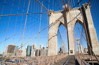 Brooklyn bridge connecting Brooklyn island with financial district on Manhattan, New York, United States of America