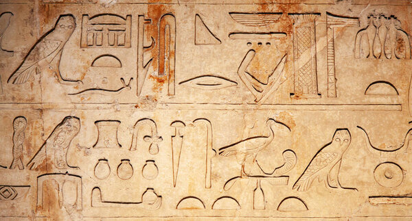 Egyptian hieroglyphs on the wall