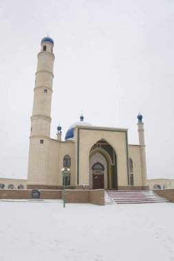 Beautiful Muslim mosque in blue skies and grass. High qualiti photo.