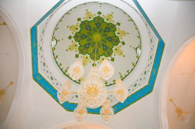 Beautiful Muslim mosque in blue skies and grass. High qualiti photo.