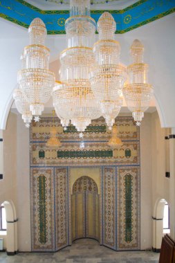 Beautiful Muslim mosque in blue skies and grass. High qualiti photo.