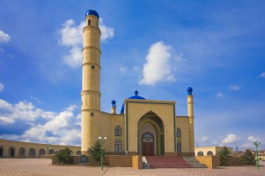 Beautiful Muslim mosque in blue skies and grass. High qualiti photo.