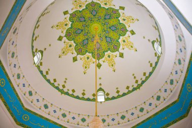 Beautiful Muslim mosque in blue skies and grass. High qualiti photo.