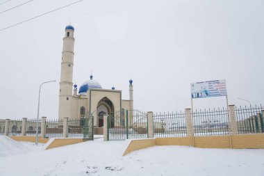 Beautiful Muslim mosque in blue skies and grass. High qualiti photo.