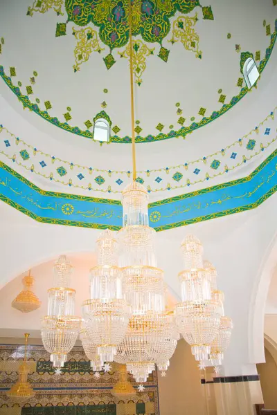 Beautiful Muslim mosque in blue skies and grass. High qualiti photo.