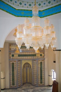 Beautiful Muslim mosque in blue skies and grass. High qualiti photo.