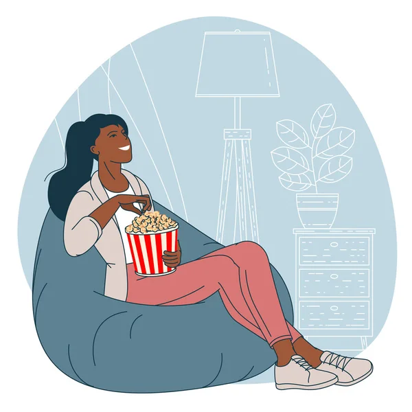 Giovane Donna Con Popcorn Sta Guardando Mentre Seduto Una Sedia — Vettoriale Stock