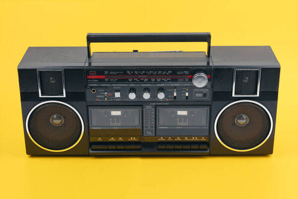 Boom Box Tape Player isolated on yellow background