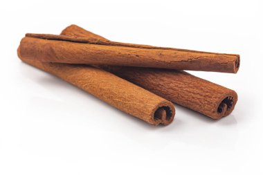 Dried Cinnamon sticks isolated over white background