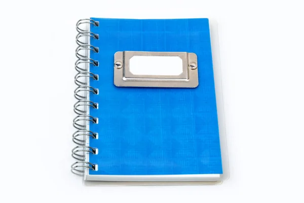 Niebieski Notatnik Metaliczną Etykietą Białym Tle — Zdjęcie stockowe
