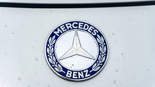 WETTENBERG, HESSE, GERMANY - 07 - 28 - 2023: MERCEDES BENZ Logo car emblem and brand logo. Modern and high technology car build by one of the Germany famous car manufacture.
