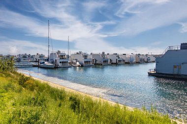 OLPENITZ, GERMANY - May 15, 2024: Baltic Sea Olpenitz Holiday Resort with Floating Houses clipart