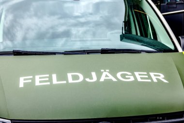 WETZLAR, GERMANY - JULY 05 - 2024: FELDJGER LOGO  on german military Vehicle.  clipart