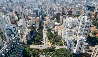 Aerial view of 9 de Julho avenue, commercial and residential buildings in the downtown in Sao Paulo city,  Brazil. clipart