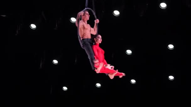 Circus Aerial Hoop Duo Black Background Performing Risky Tricks Man — Stock Video