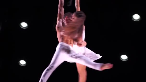 Aerial Straps Duo White Costumes Black Background Performing Slow Motion — Stock Video