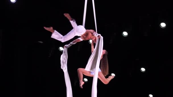 Aerial Silk Duo White Costumes Black Background Performing Slow Motion — Stock Video