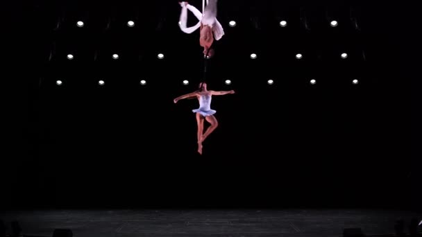 Aerial Silk Duo White Costume Black Stage Background Doing Performance — Stock Video
