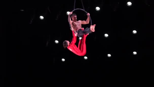 Circus Aerial Hoop Duo Black Background Performing Risky Tricks Man — Stock Video