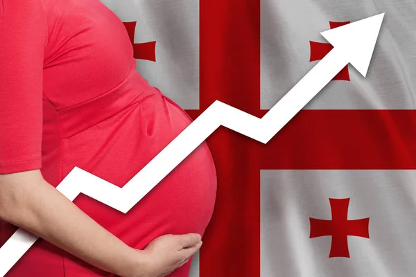 Georgian pregnant woman on flag of Georgia background. Birth rate up