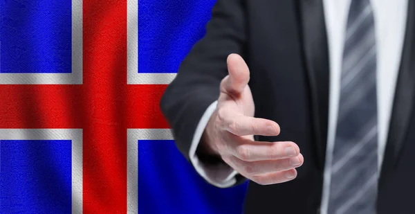 アイスランドのビジネス 協力と旅行の概念 アイスランドの国旗を手に — ストック写真
