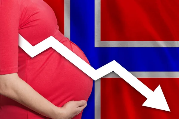 Norwegian pregnant woman on Norwegian flag background. Falling fertility rate in Norway