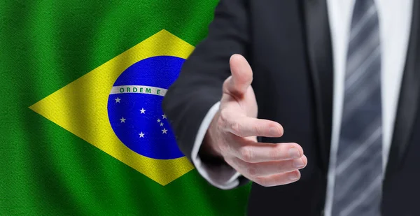 Bienvenidos Brasil Mano Sobre Fondo Bandera Brasileña Negocios Política Cooperación — Foto de Stock