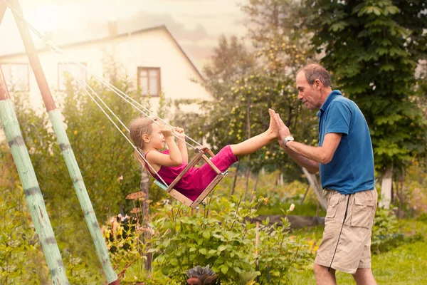 Cute Little Girl Swing Smiling Child Playing Grandpa Outdoors Summer — Stock Photo, Image